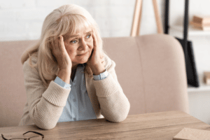 Worried elderly woman