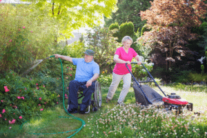 Elderly man and Nurse Next Door caregiver gardening
